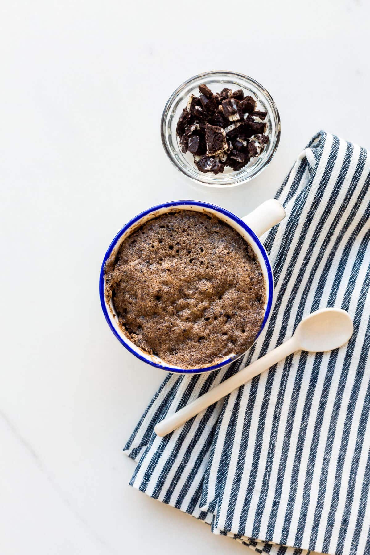 Image of Oreo mug cake after cooking in a mug in a microwave.