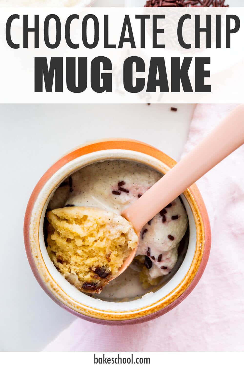 Chocolate chip mug cake cooked directly in a mug and served with ice cream and chocolate sprinkles.