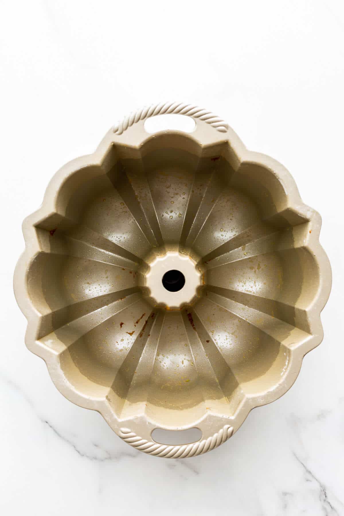 A bundt pan after unmoulding a cake.