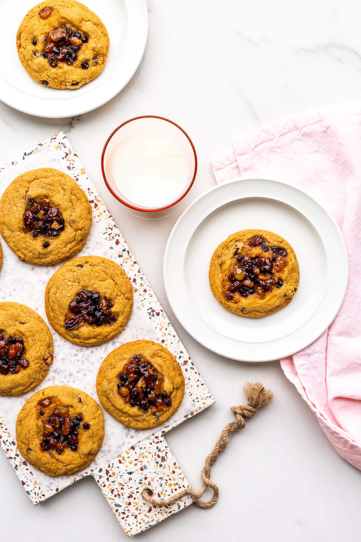 Mincemeat cookies served with a glass of milk.