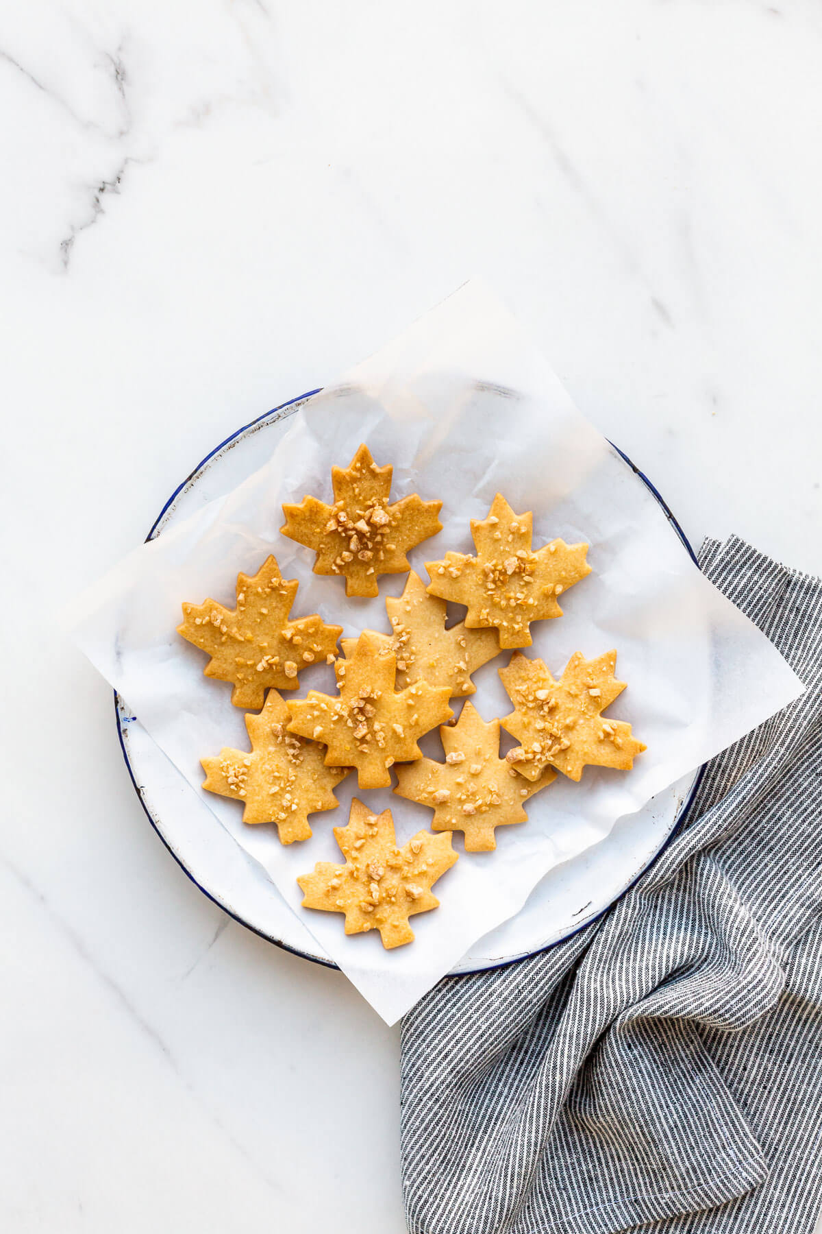 A plate of maple shortbread cookies ready to be eaten.