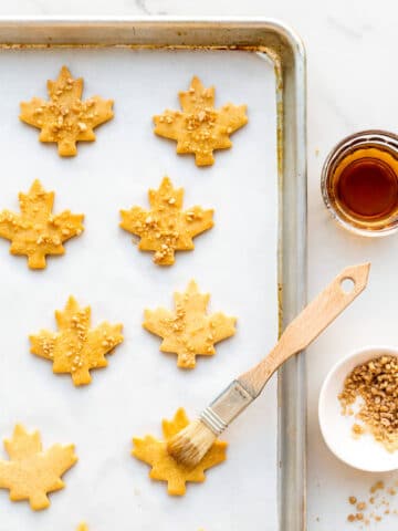Maple shortbread cookies glazed with real maple syrup and maple flakes