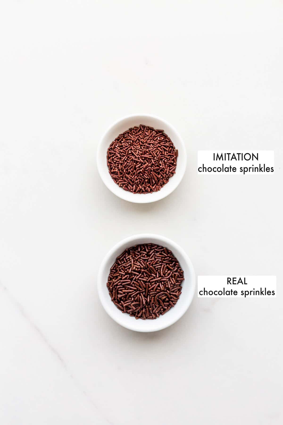 Imitation chocolate sprinkles versus real chocolate sprinkles which are darker.