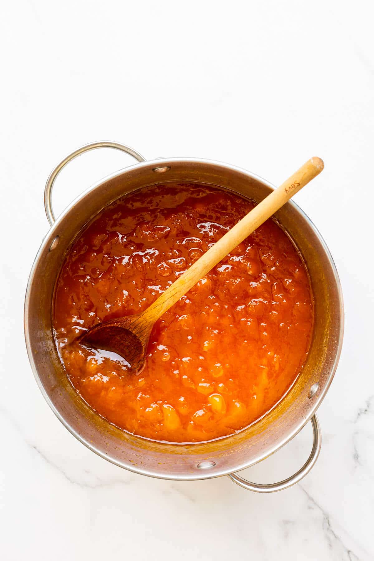 A pot of apricot marmalade after boiling it to the jam setting point.