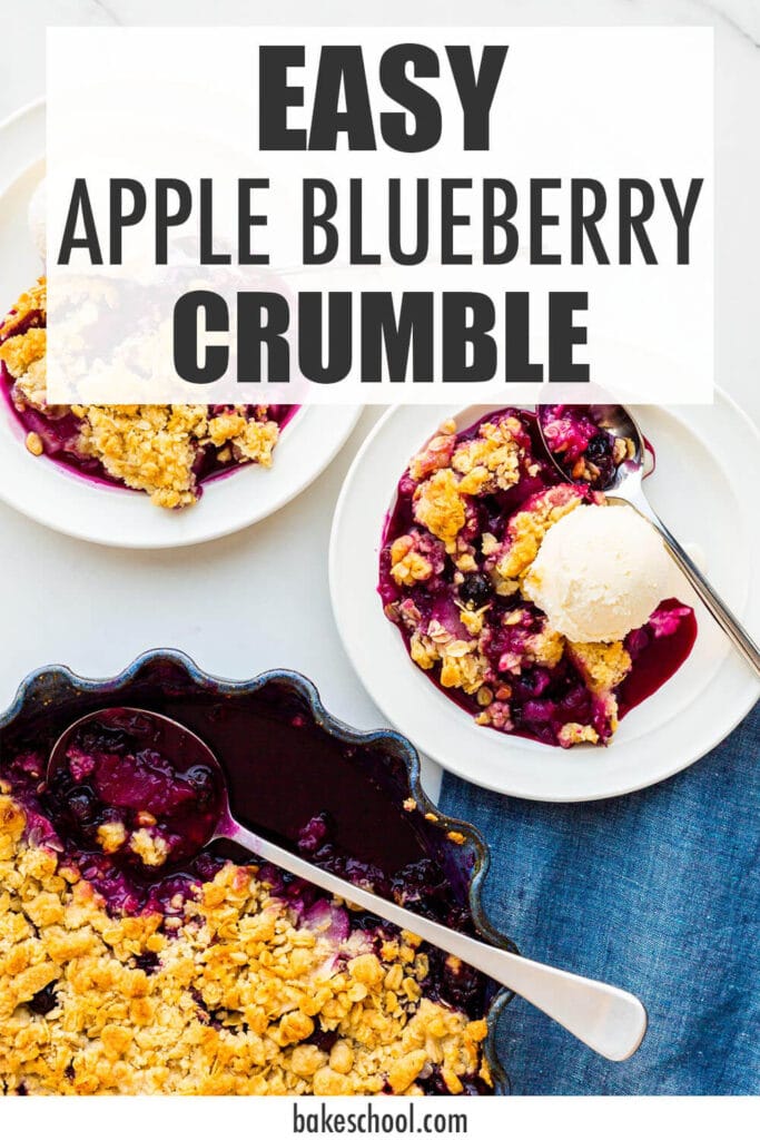 An apple and blueberry crumble being served with vanilla ice cream.