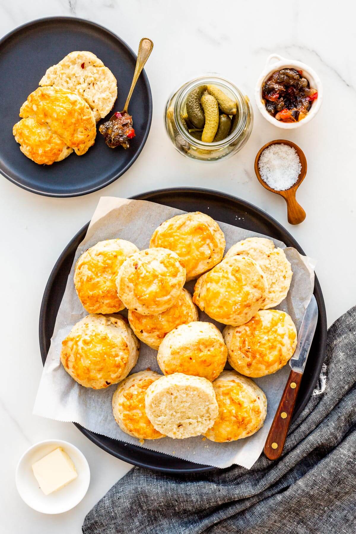 A plate of cheese scones ready to be eaten