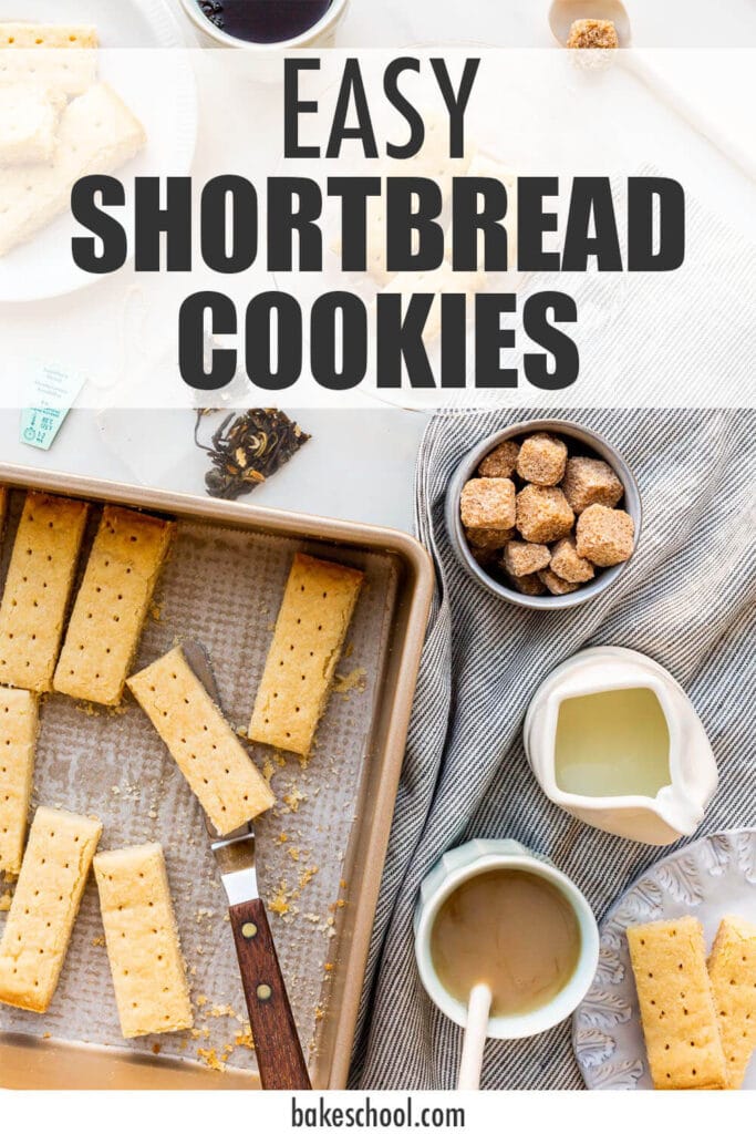 Shortbread cookies being served on small plates with cups of tea, milk, and sugar cubes.