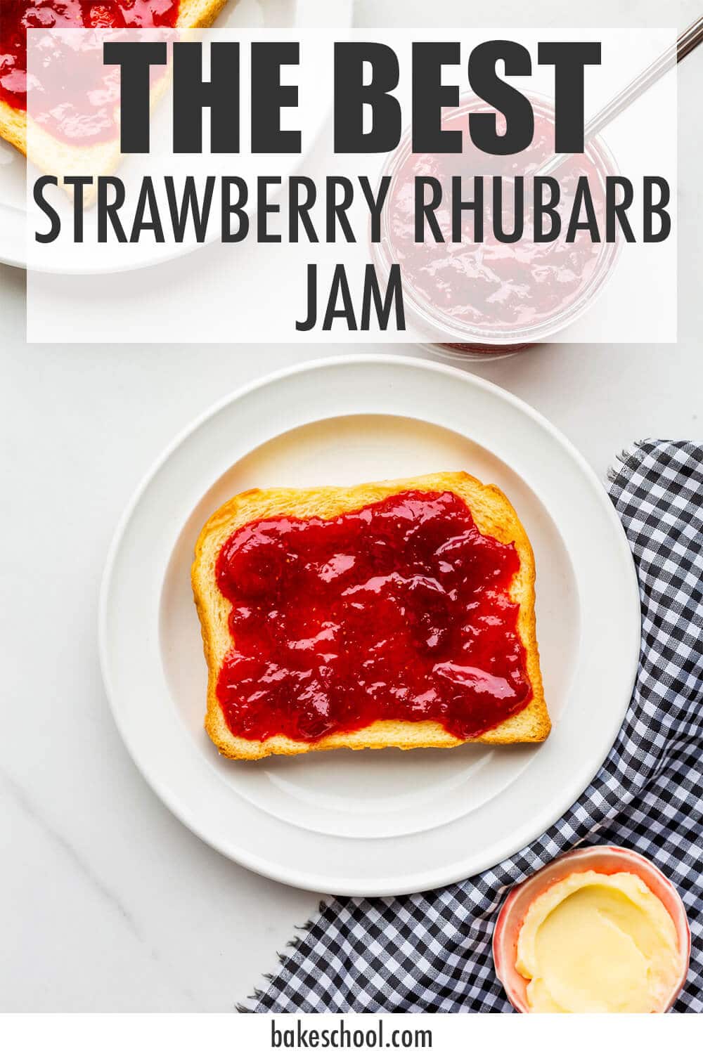 Homemade strawberry rhubarb jam spread on a piece of toast, with butter on the side.