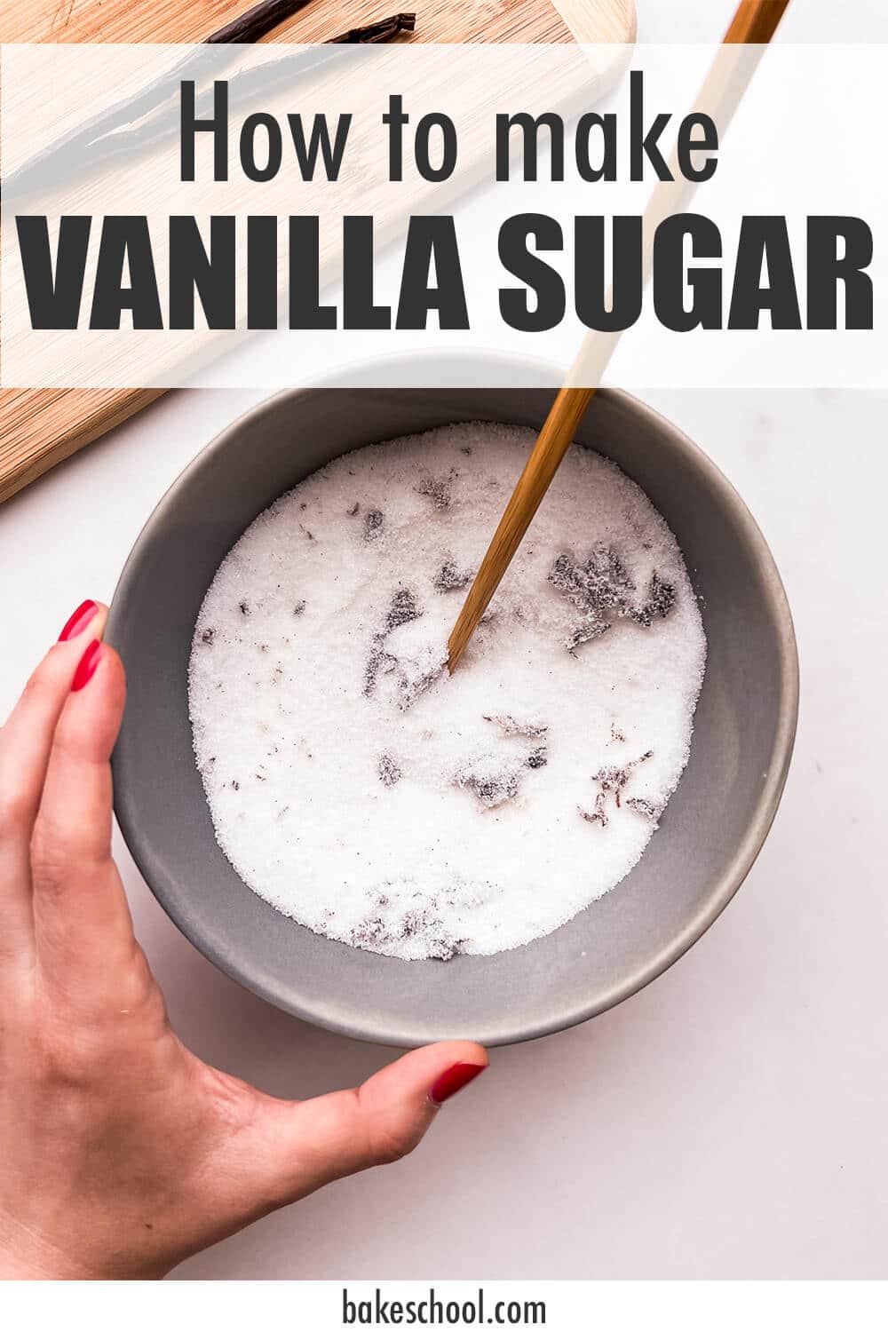 Mixing vanilla bean seeds (caviar) with granulated sugar in a bowl to make vanilla sugar.