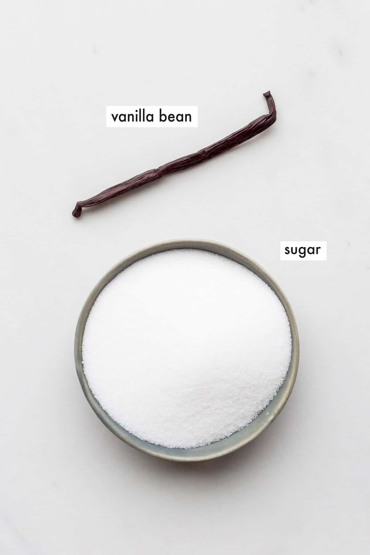 The two ingredients to make vanilla sugar include granulated sugar and a vanilla bean.