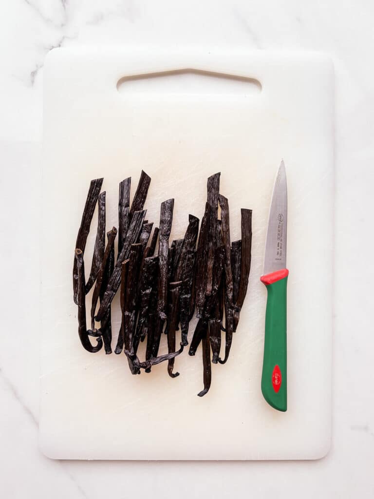 Vanilla beans split in half to fit into a jar to make extract.