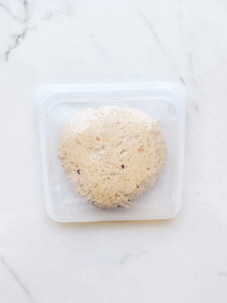 Cracker dough stored in a reusable resealable sandwich bag.