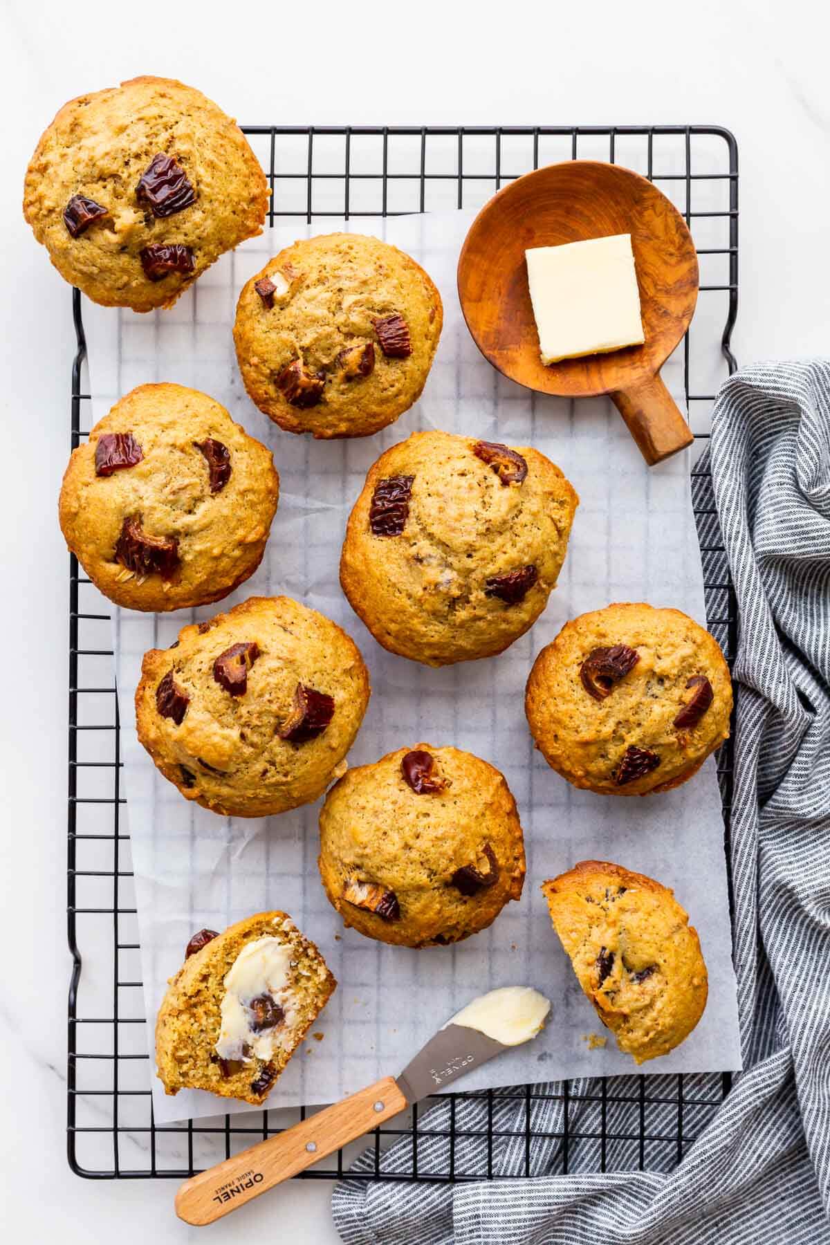 Serving date bran muffins with butter for breakfast.