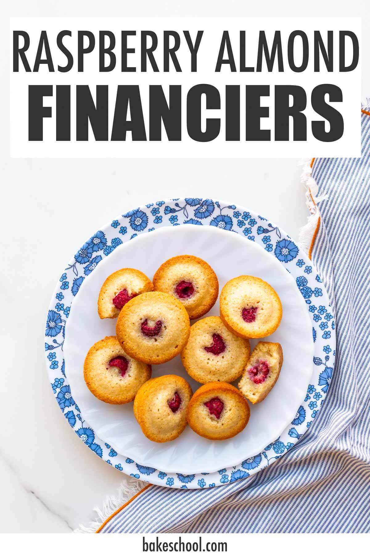 A floral plate of raspberry almond financiers with a striped napkin.