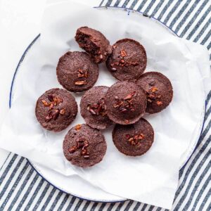 A plate of chocolate financiers ready to be eaten.