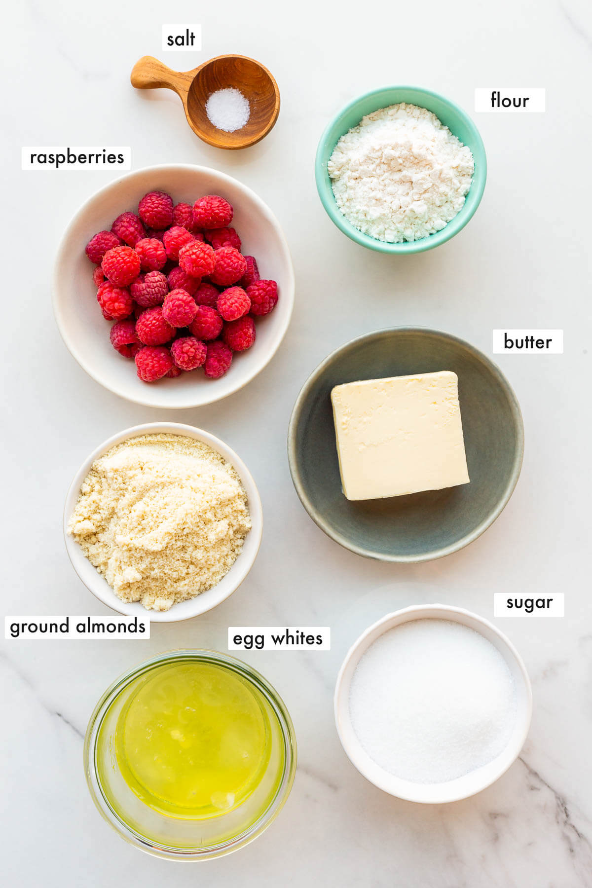 Ingredients to make almond financiers with raspberries, measured out and ready to bake.