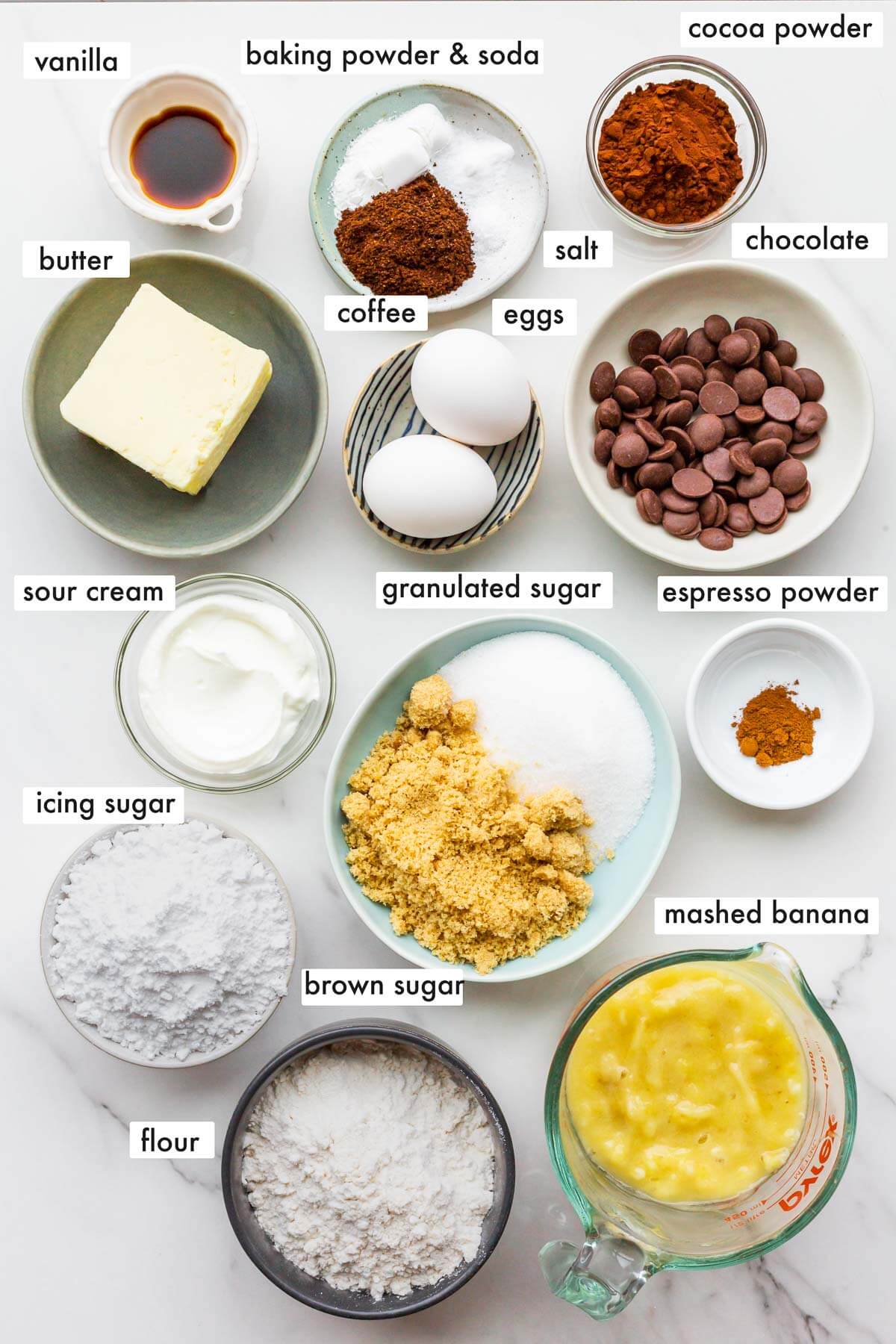 Ingredients to make a banana snack cake measured out and ready to be mixed.