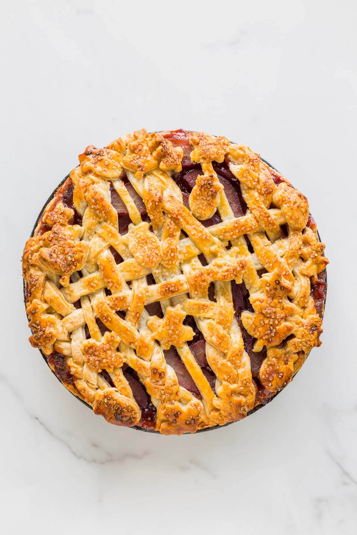 A lattice pie crust with woven in for a more elaborate and decorative top crust.