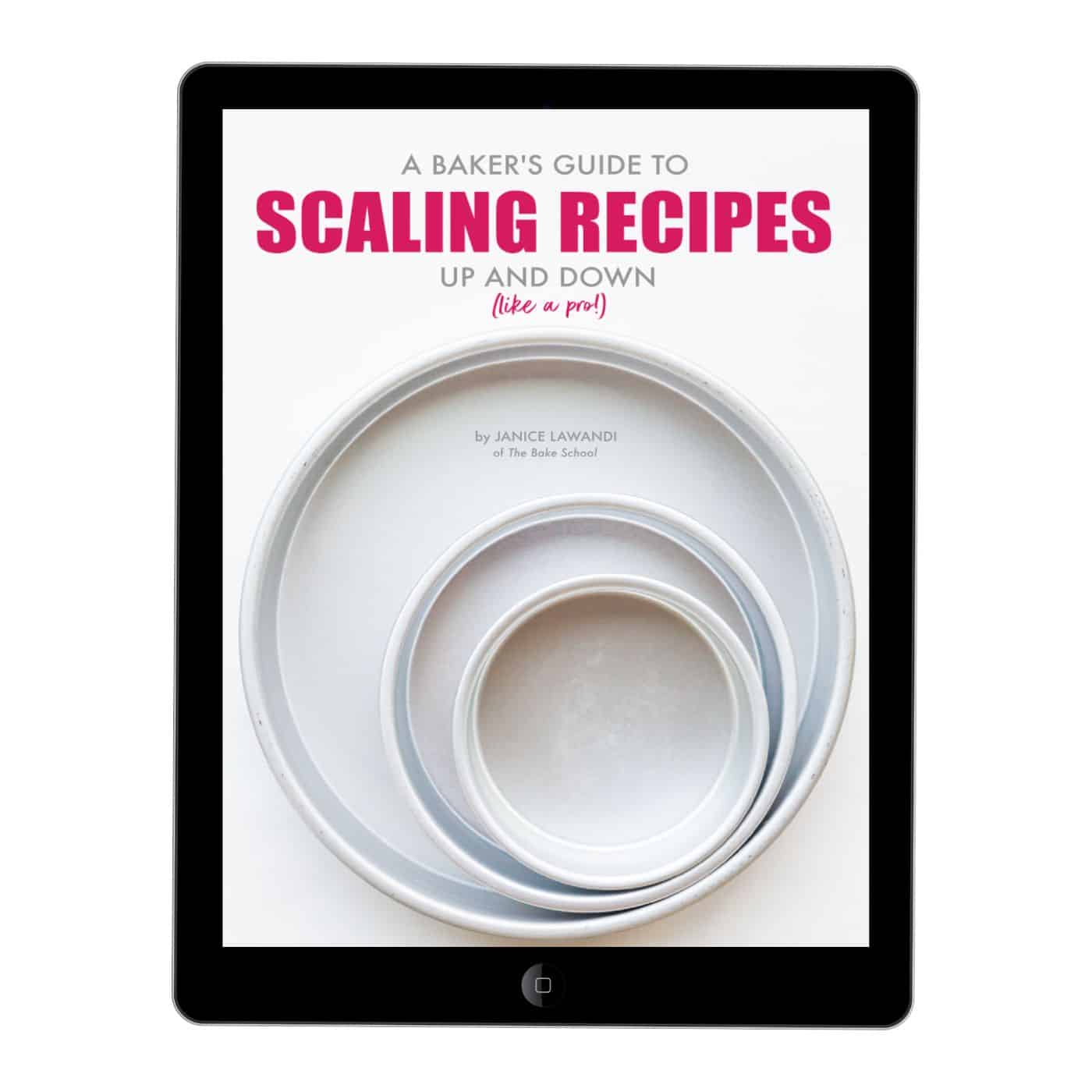 An ebook about scaling baking recipes up and down displayed on a tablet screen.