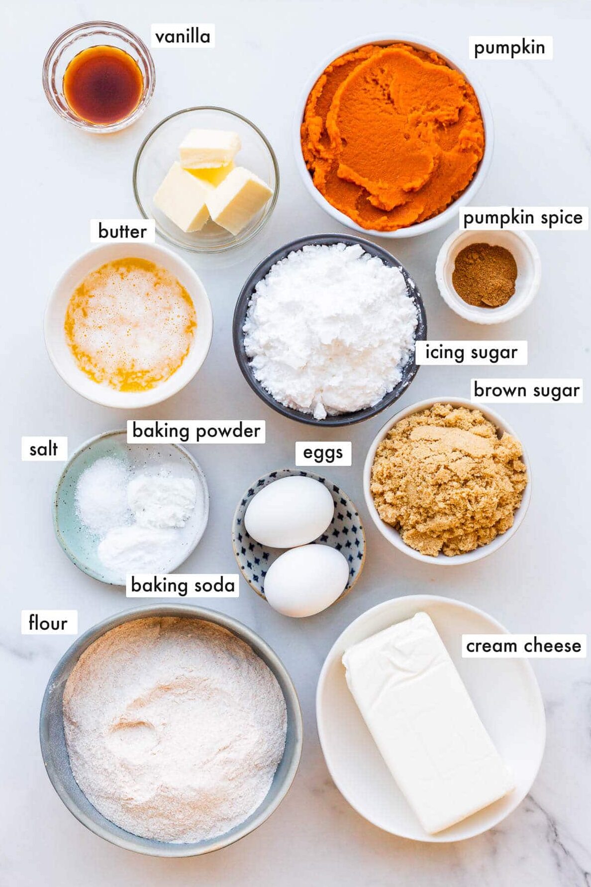 Ingredients to make whole wheat pumpkin bread and cream cheese frosting measured out