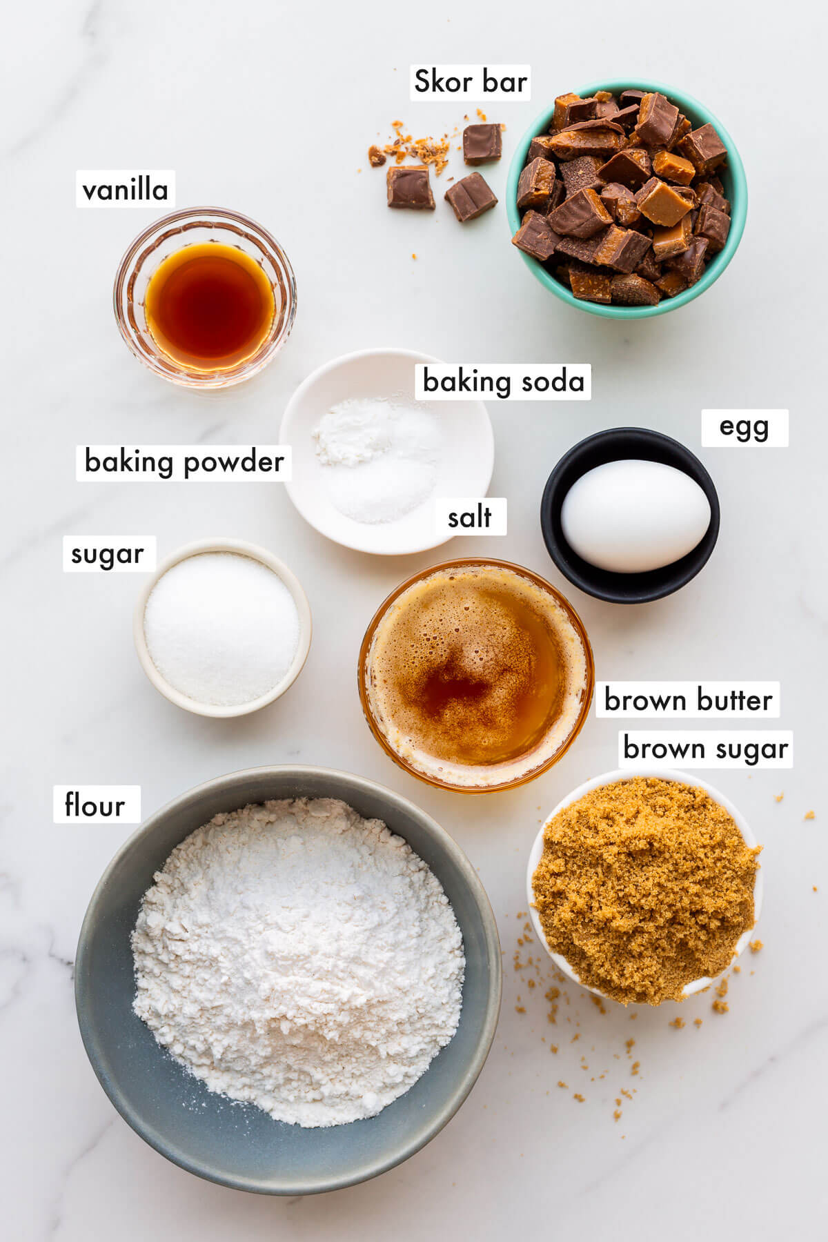 Ingredients to make blondie bars with chopped toffee chocolate bars measured out and ready to mix.