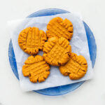 A blue plate of flourless peanut butter cookies.