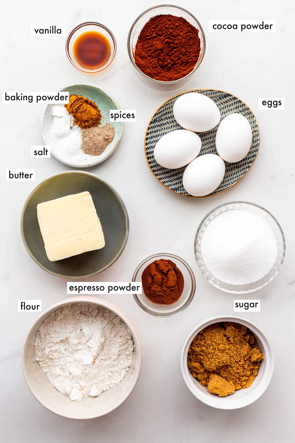 Ingredients to make chocolate pound cake with espresso powder measured out and ready to be mixed.
