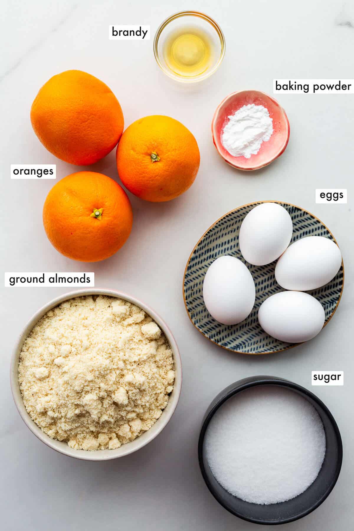 Ingredients to make a gluten-free almond cake measured out.