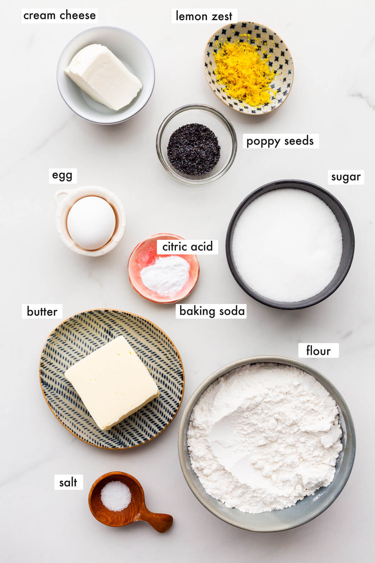 Ingredients to make lemon poppy seed cookies measured out.