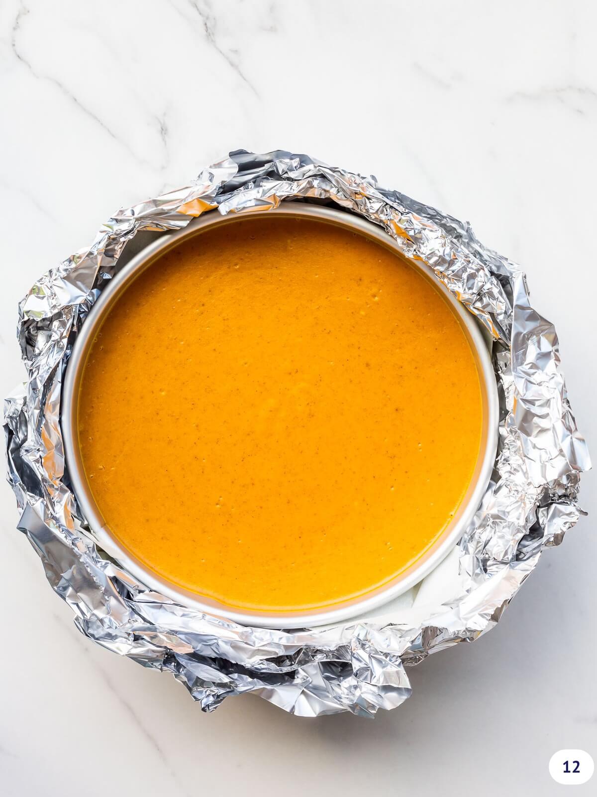 Pumpkin cheesecake after baking and cooling completely in the oven.