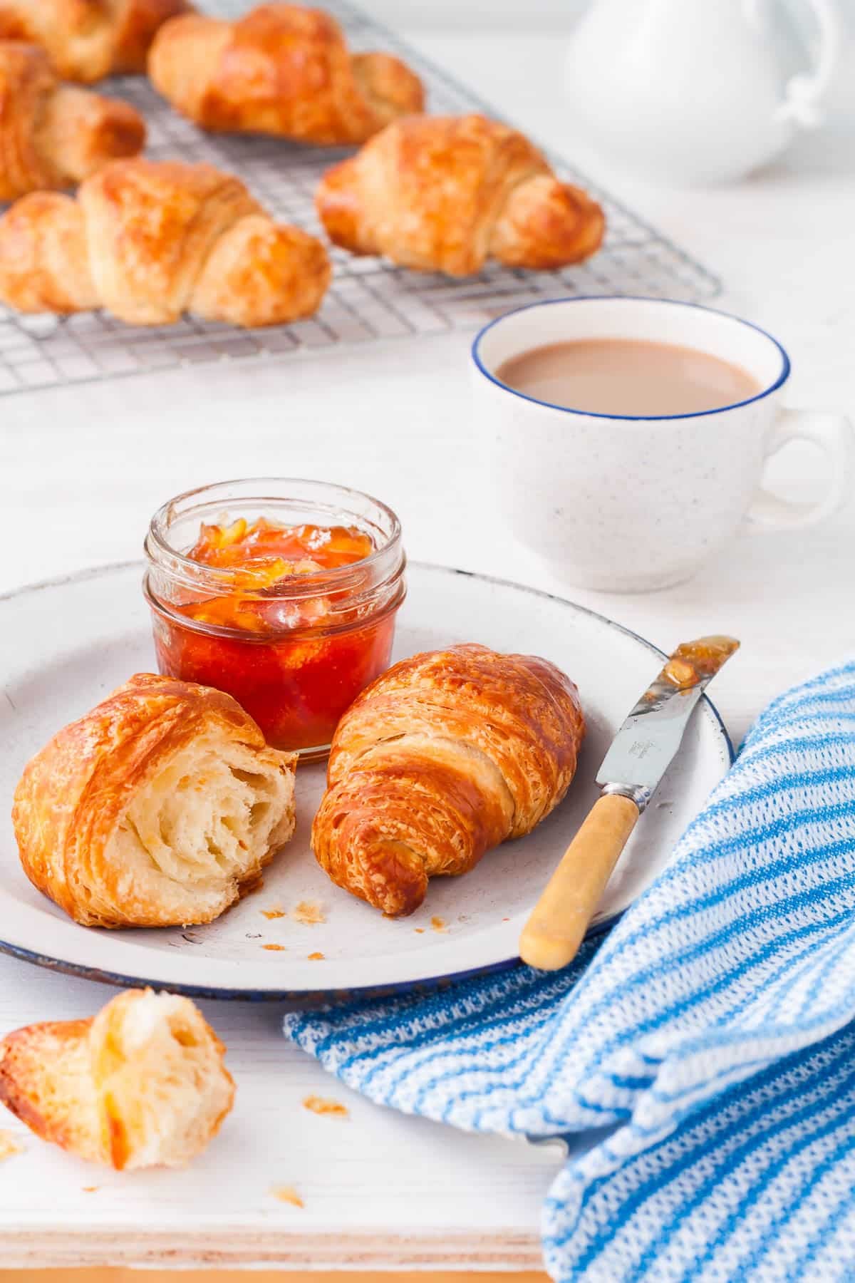 Serving three fruit marmalade with croissants.